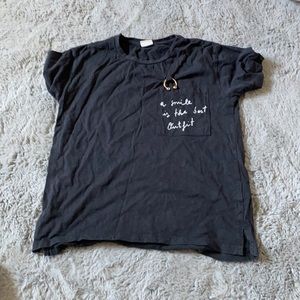 “A smile is the best outfit” short sleeve tee